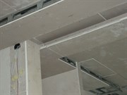 Облицовка каркаса подвесного потолка гипсокартоном
